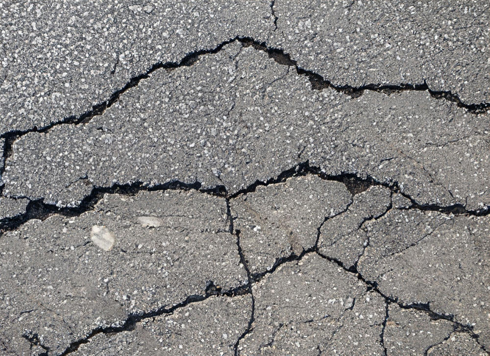 Cracked asphalt texture Background